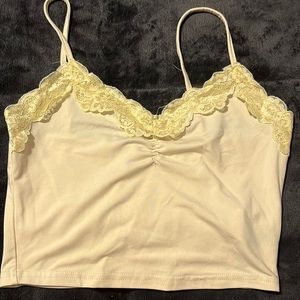 light yellow lacy tank top. size small